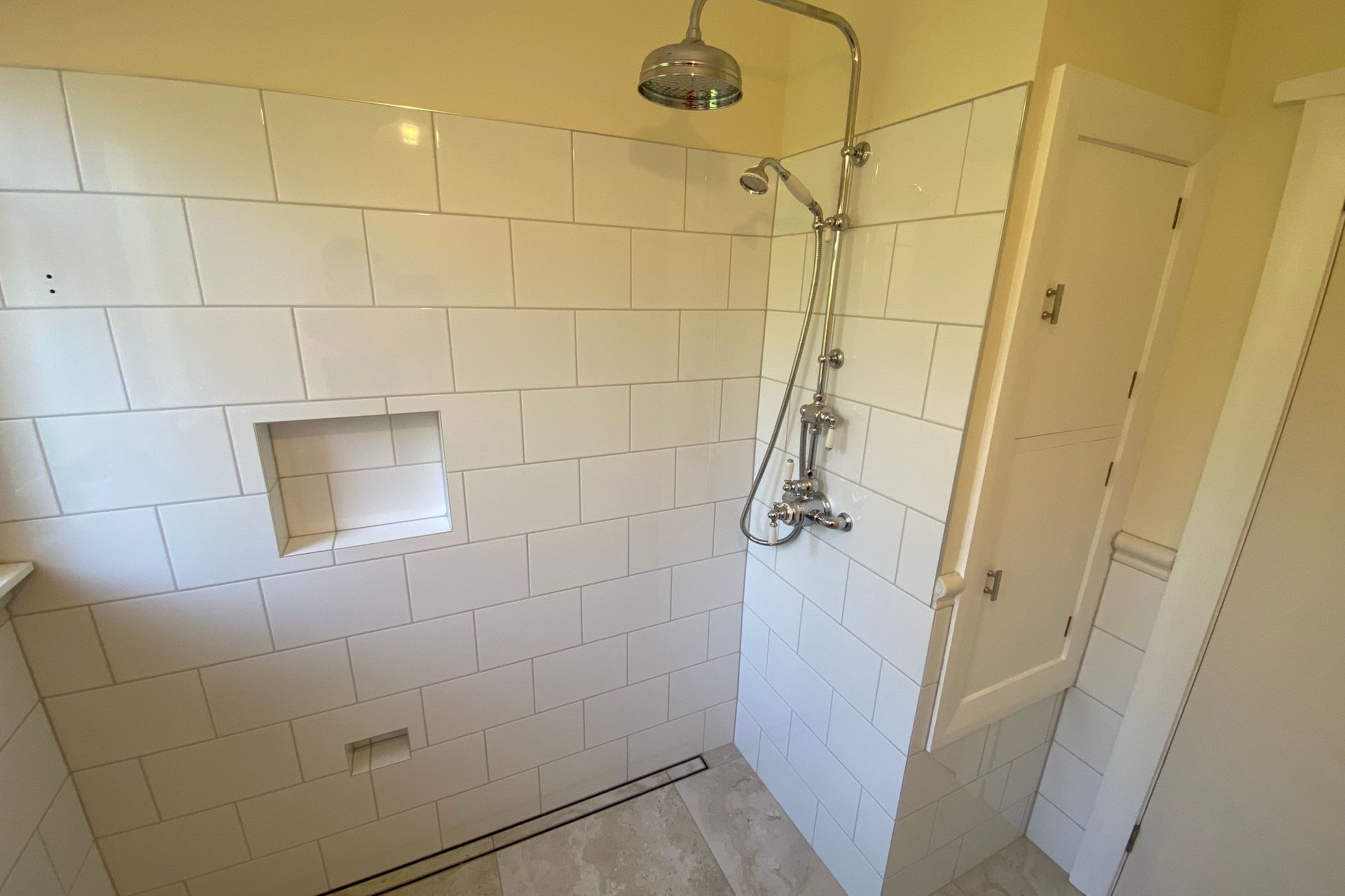 Tiled bathroom floor & shower walls