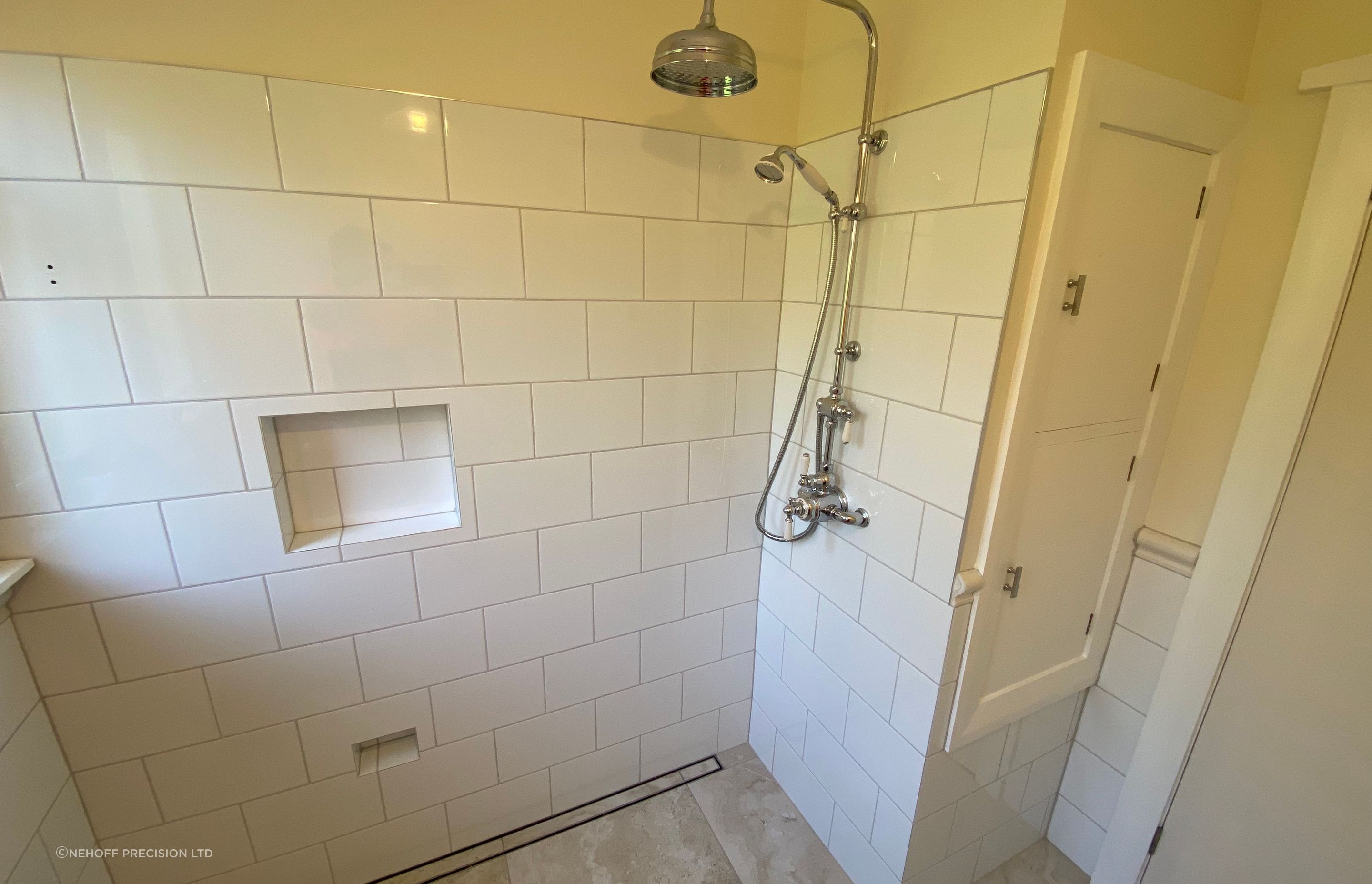 Tiled bathroom floor &amp; shower walls