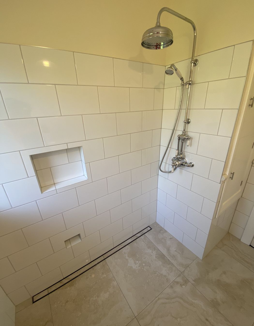 Tiled bathroom floor & shower walls