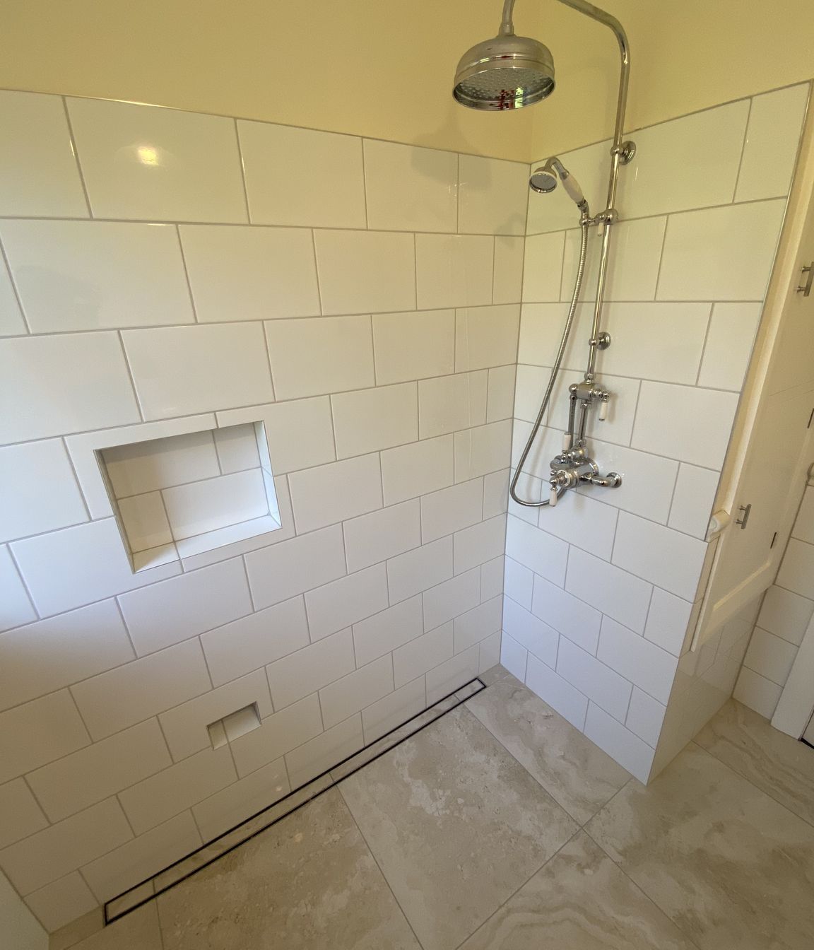 Tiled bathroom floor &amp; shower walls