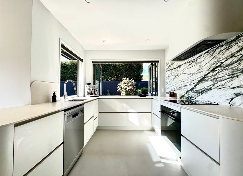 Clean Lines, Warm Timber & Bold Stone Kitchen/Bathroom Renovation