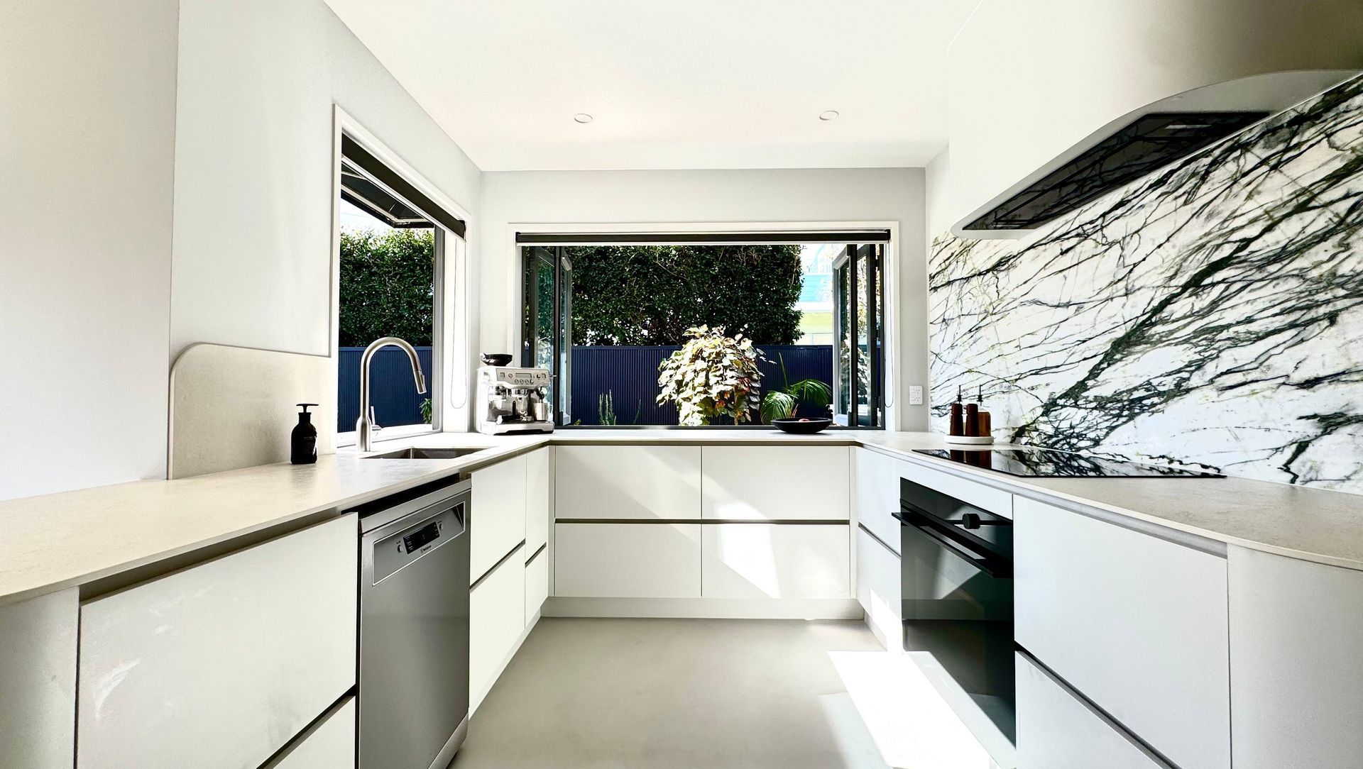 Clean Lines, Warm Timber & Bold Stone Kitchen/Bathroom Renovation banner