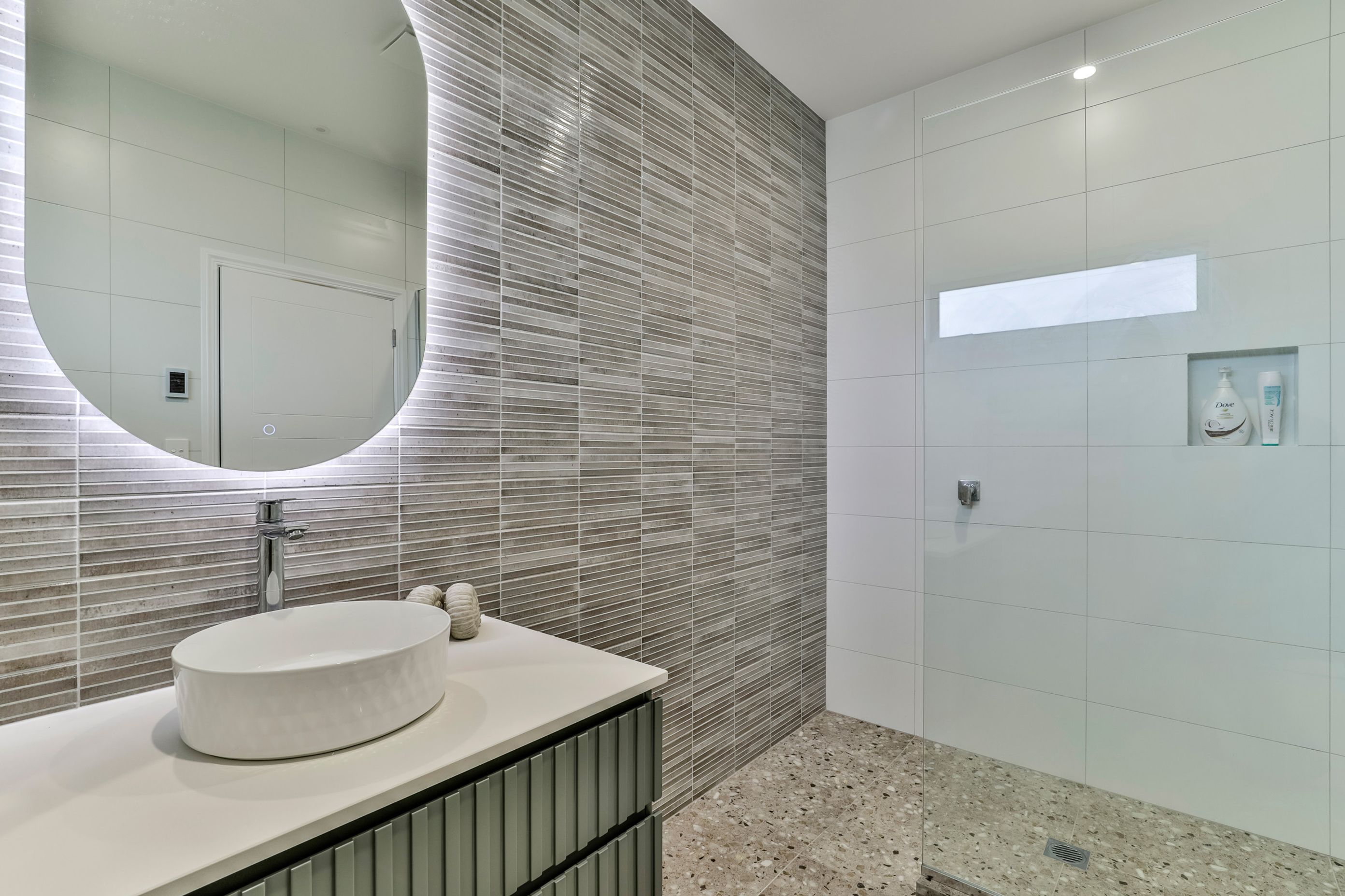 TILE DEPOT / Tiles: Home Kit Kat Ash 125x250mm , Blanco Brillo Matt 300x600mm, Frammenta Taupe 597x597mm / Bathware also supplied by Tile Depot