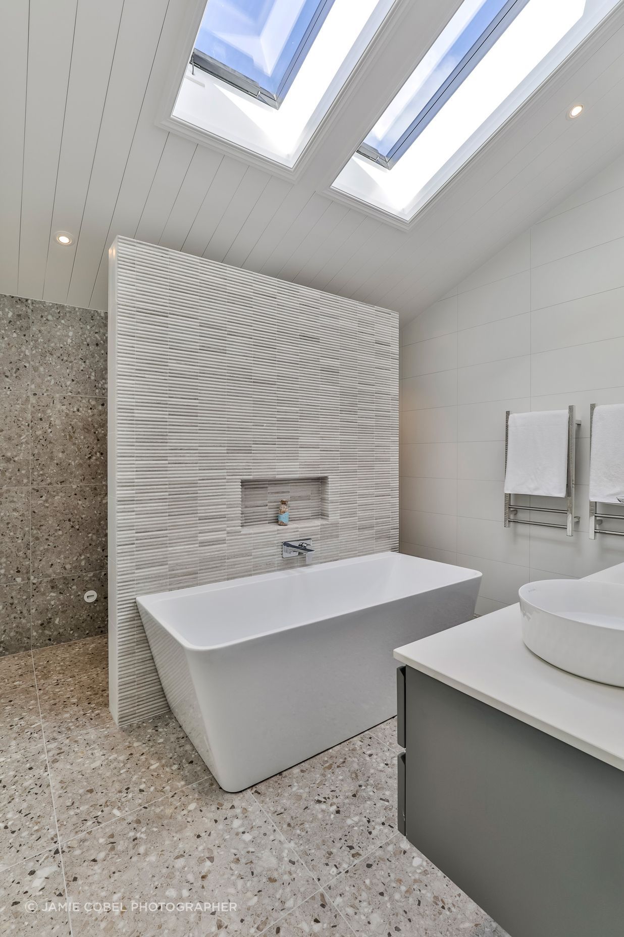 TILE DEPOT / Tiles: Colosseum Travertine 305x305mm, Blanco Brillo Matt 300x600mm, Frammenta Taupe 597x597mm / Heated Towel Rails: Heirloom Forme