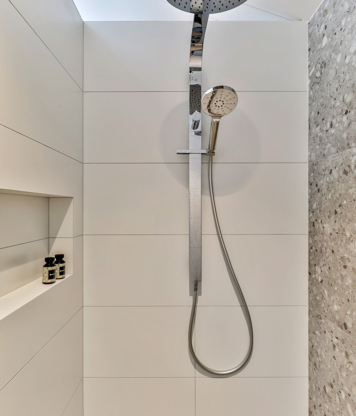 TILE DEPOT / Tiles: Blanco Brillo Matt 300x600mm, Frammenta Taupe 597x597mm / Tapware: Eclipse Double Shower Head (Round) Chrome