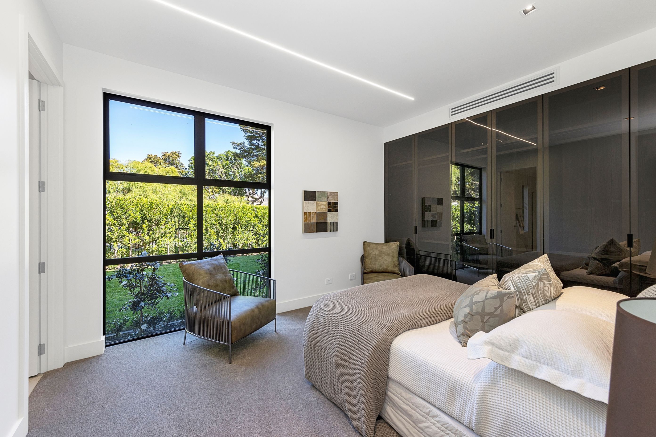 bedroom-2-bronze-glass-wardrobe.jpg
