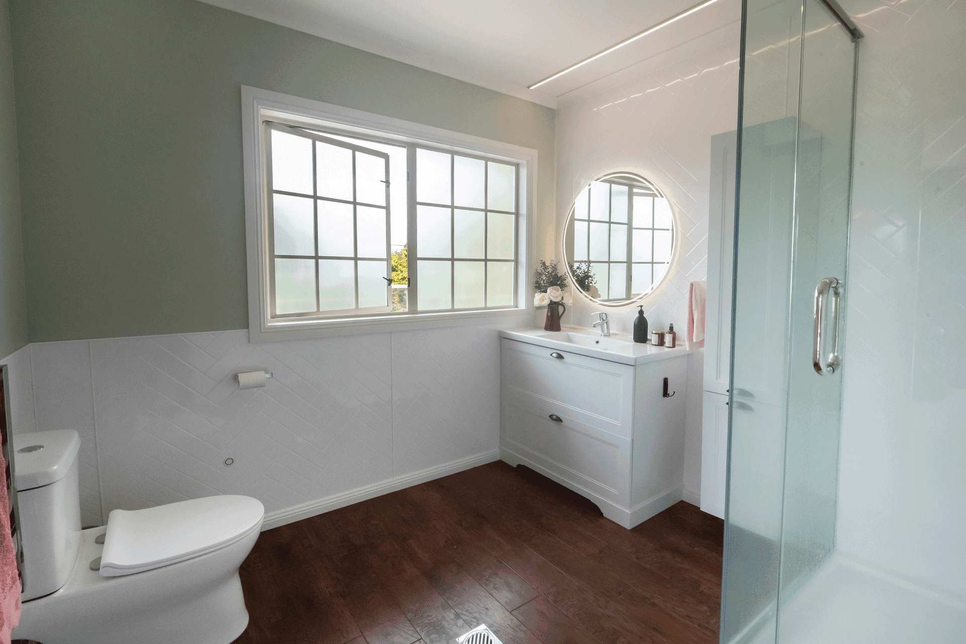 Our goal with ensuites it to make sure there is plenty of storage so the room can always look tidy and there is good lighting