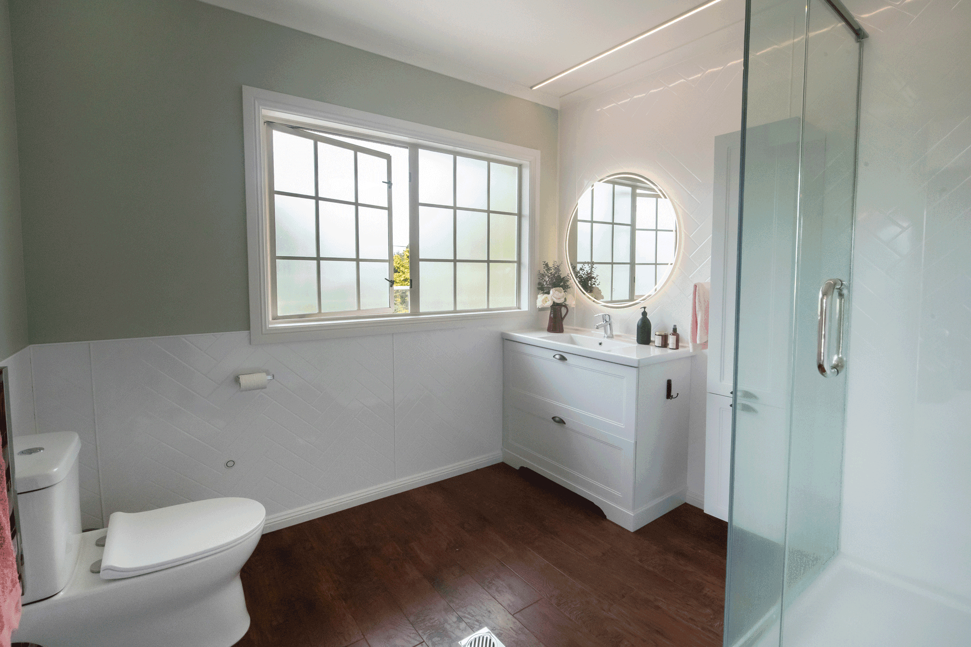 Our goal with ensuites it to make sure there is plenty of storage so the room can always look tidy and there is good lighting