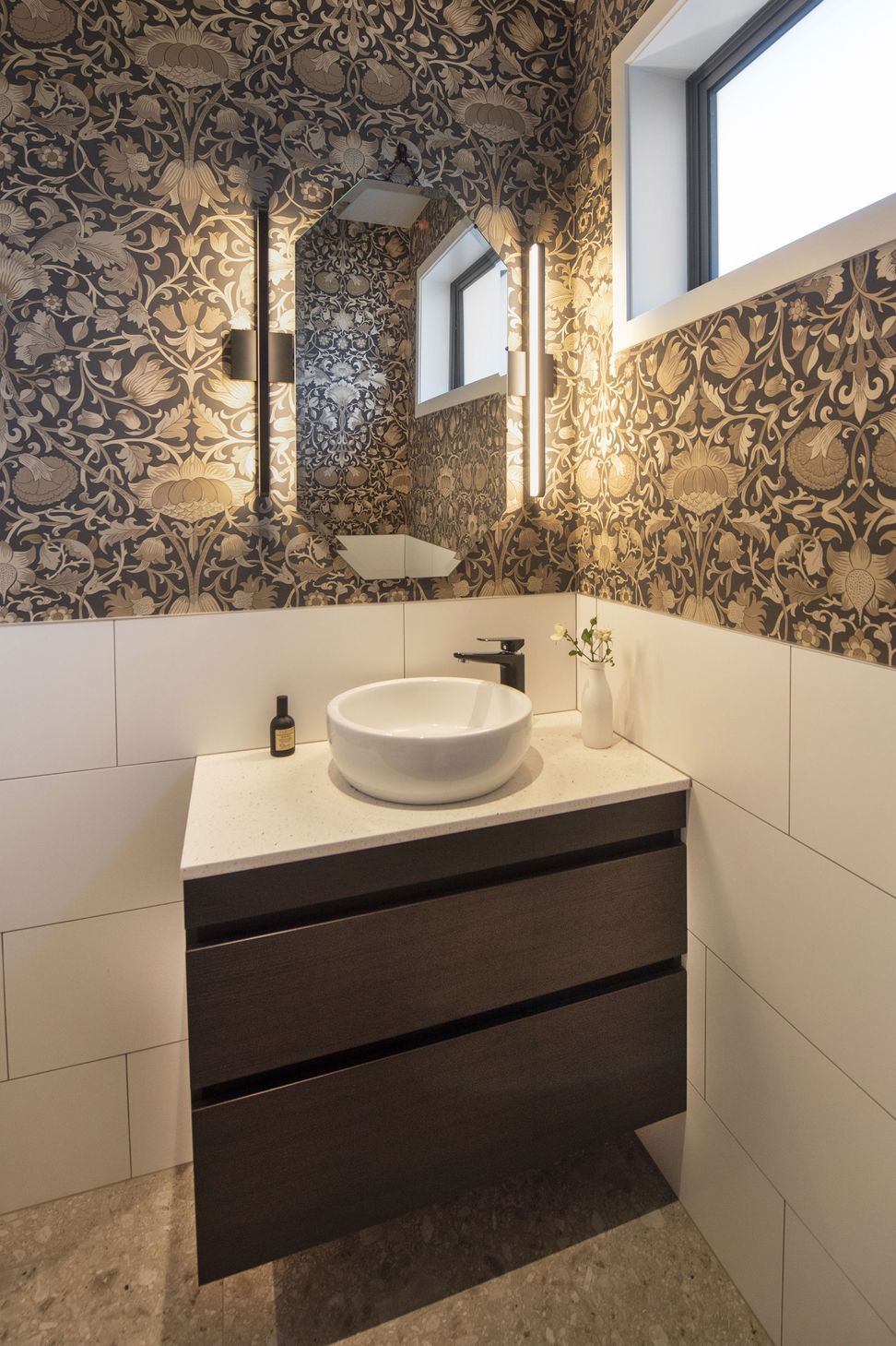 Powder room with glorious wallpaper