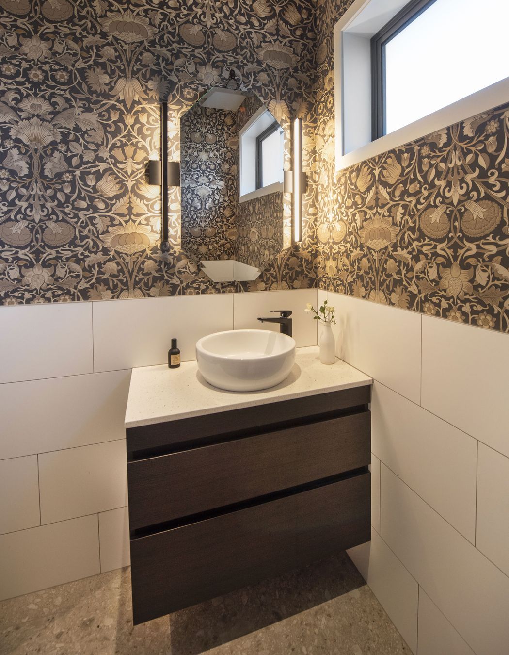 Powder room with glorious wallpaper