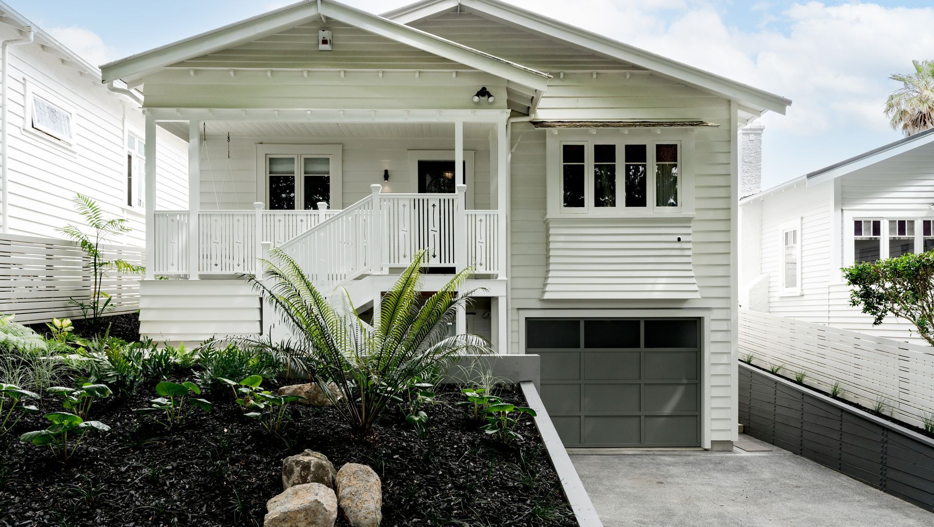 The project involved a major excavation under the home’s existing foundation to create a basement-level garage, bedroom, bathroom, and stairwell to access the upper floor.