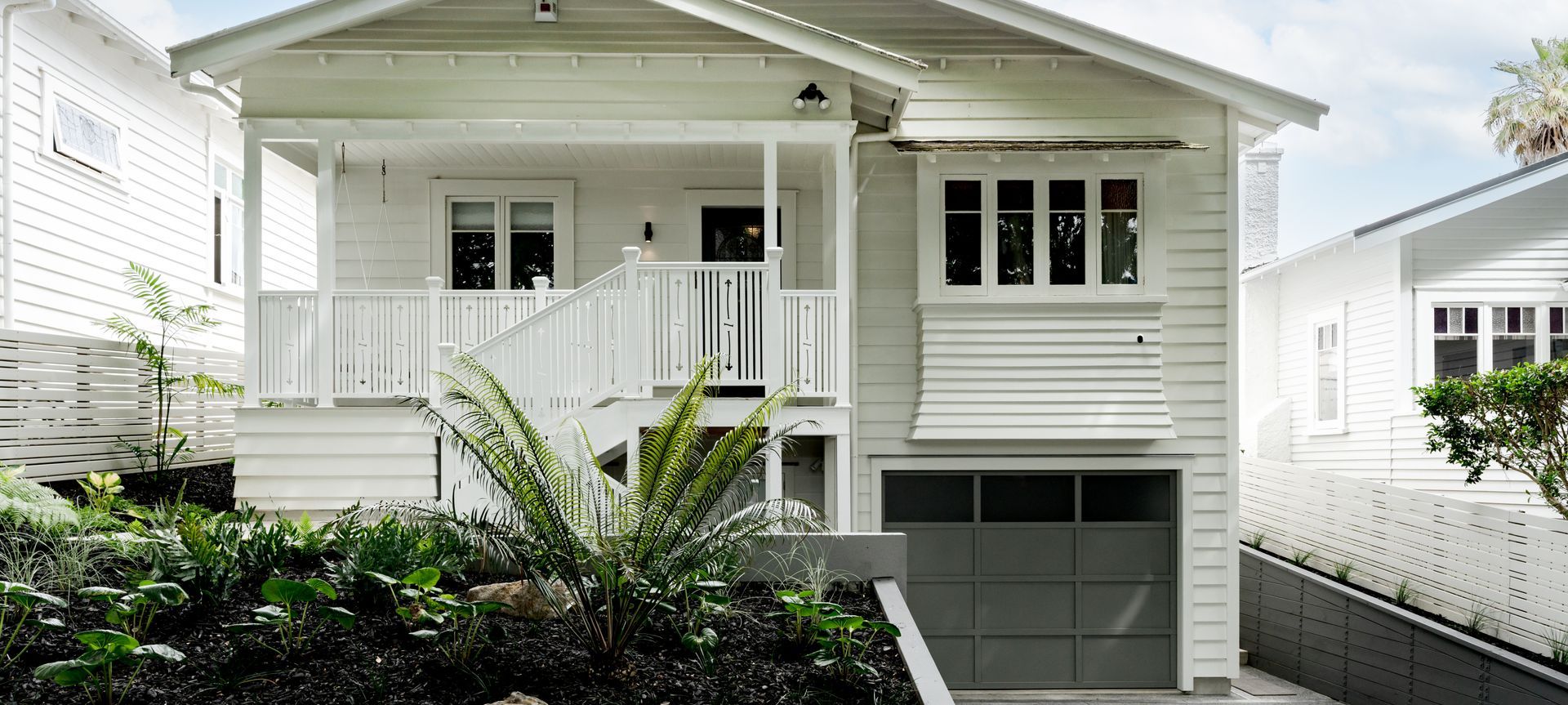 The project involved a major excavation under the home’s existing foundation to create a basement-level garage, bedroom, bathroom, and stairwell to access the upper floor.