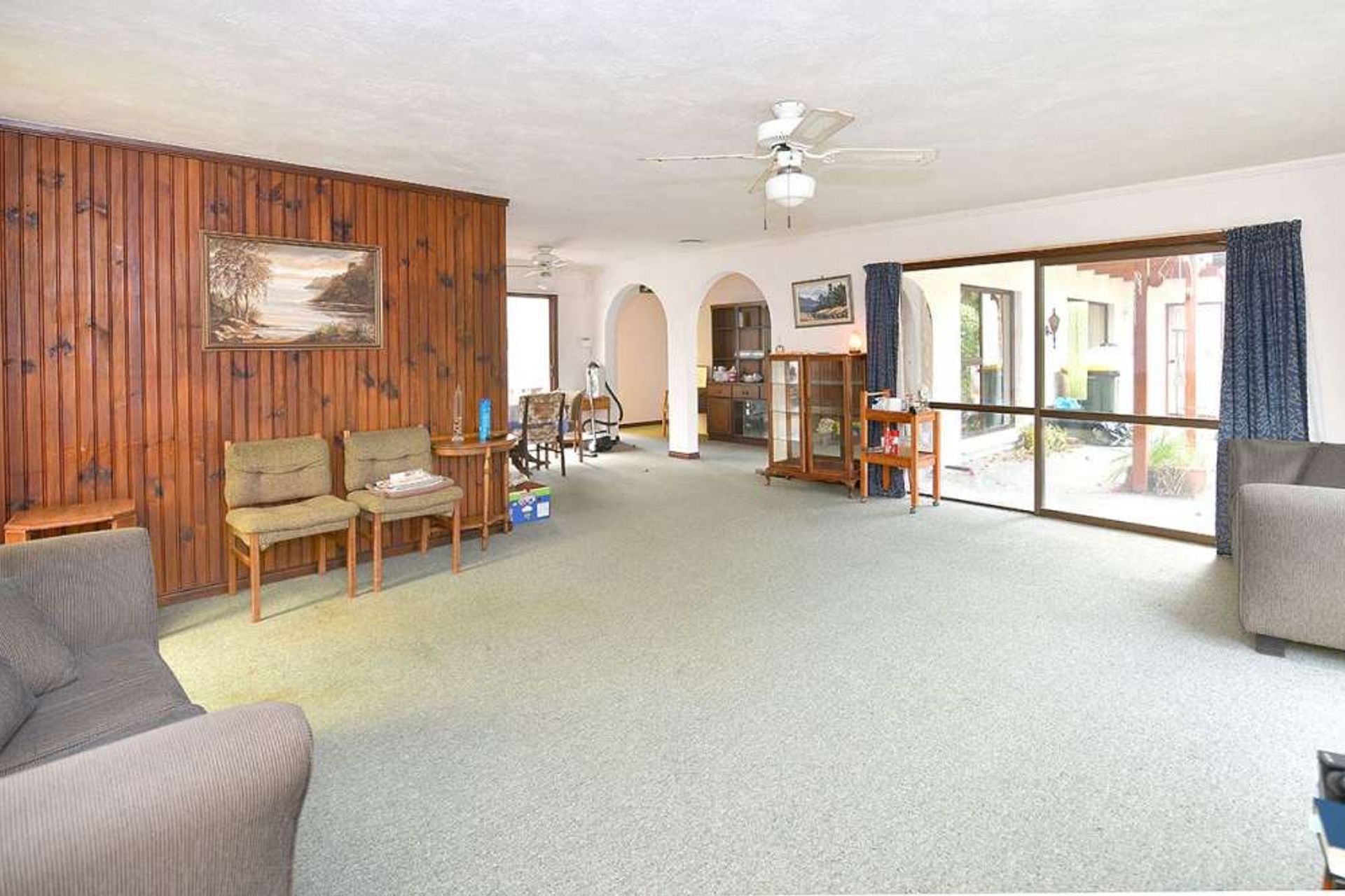 Before Renovation. The kitchen was behind the wooden wall and closed off. 