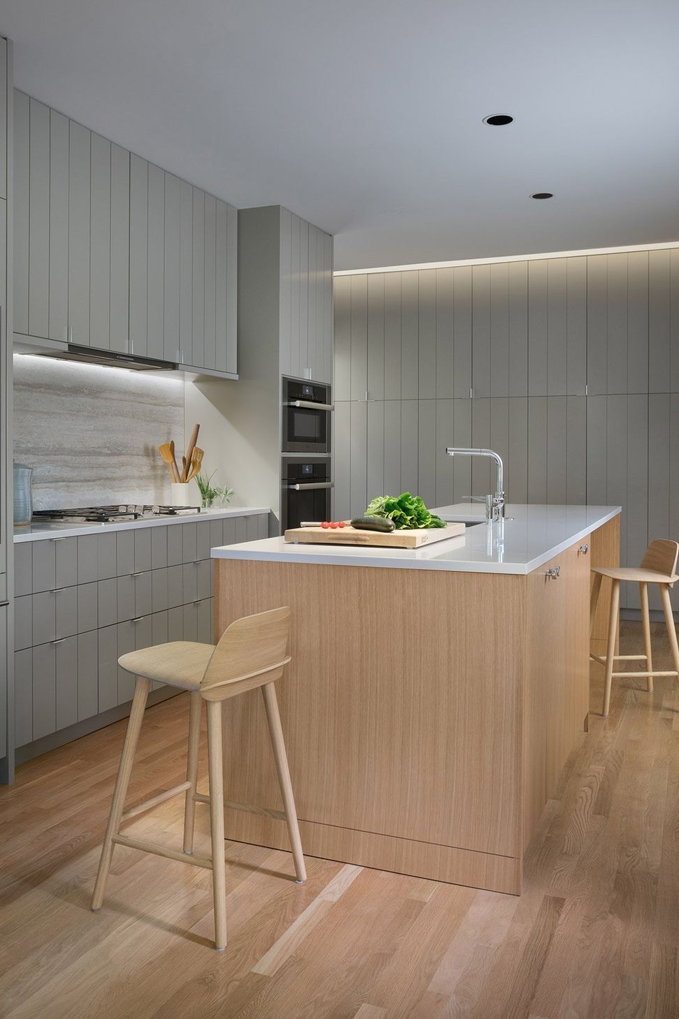 7HeritageOakCottageCuppettKilpatrickArchitectureandInteriorDesignaustin-tx-modern-kitchen-minimalist-wood-island-hidden-millwork-1.jpg