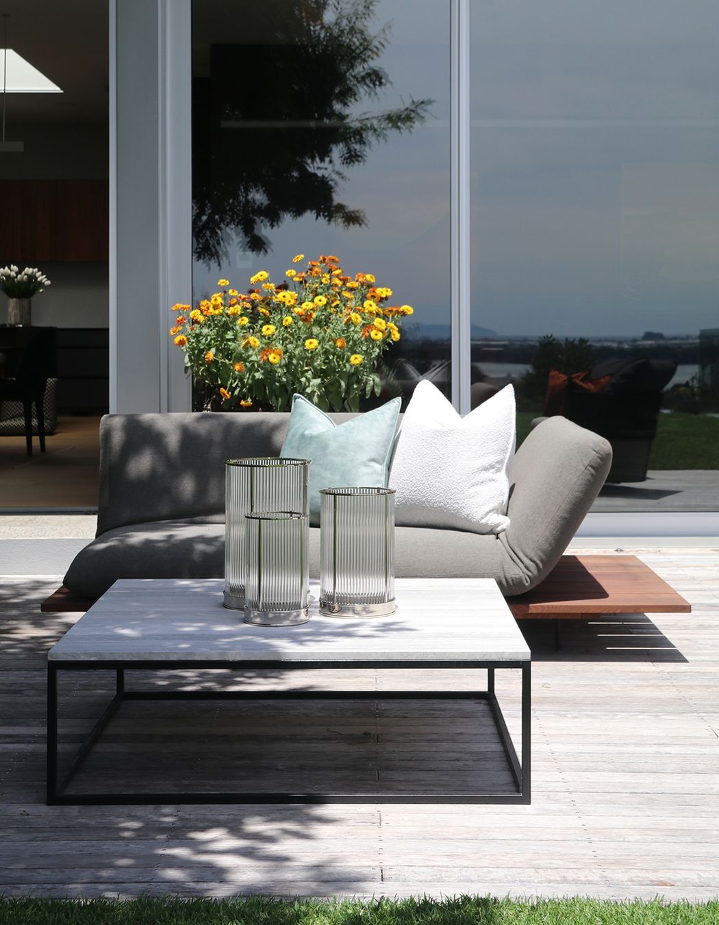 Custom outdoor coffee table with a metal frame & Ocean Travertine top