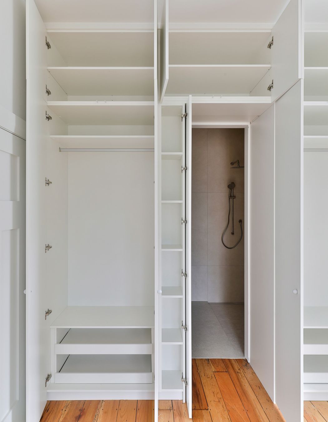 Custom wardrobe with hidden ensuite access
