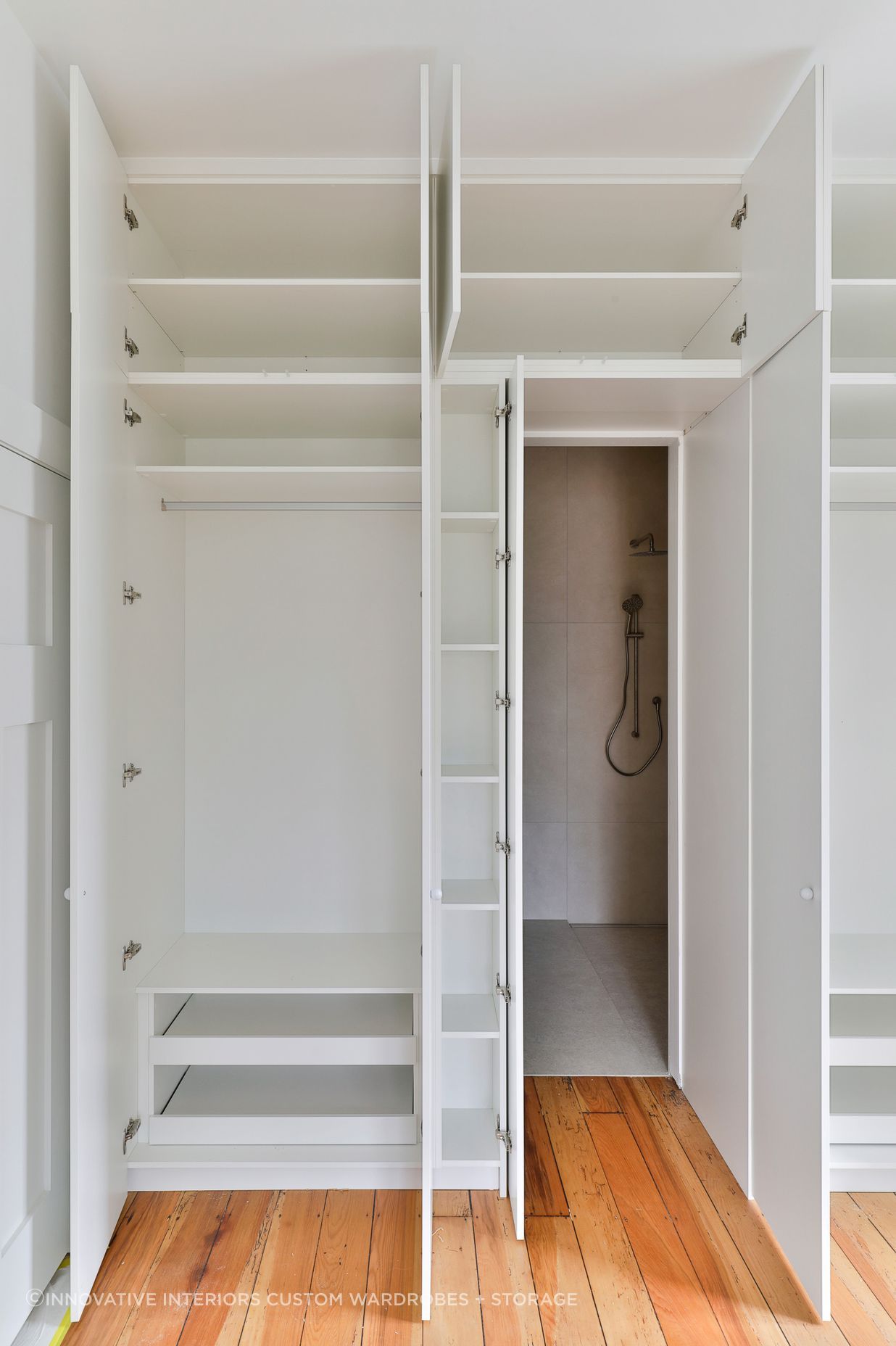 Custom wardrobe with hidden ensuite access