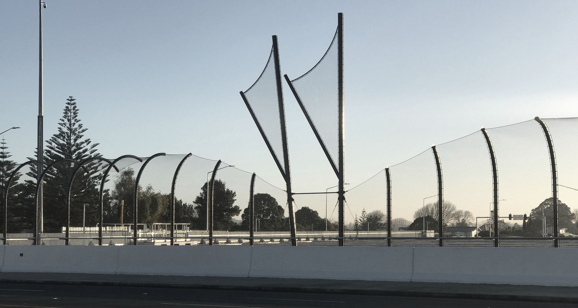 Kirkbride Road / SH20A intersection over bridge  - anti-throw mesh screens banner