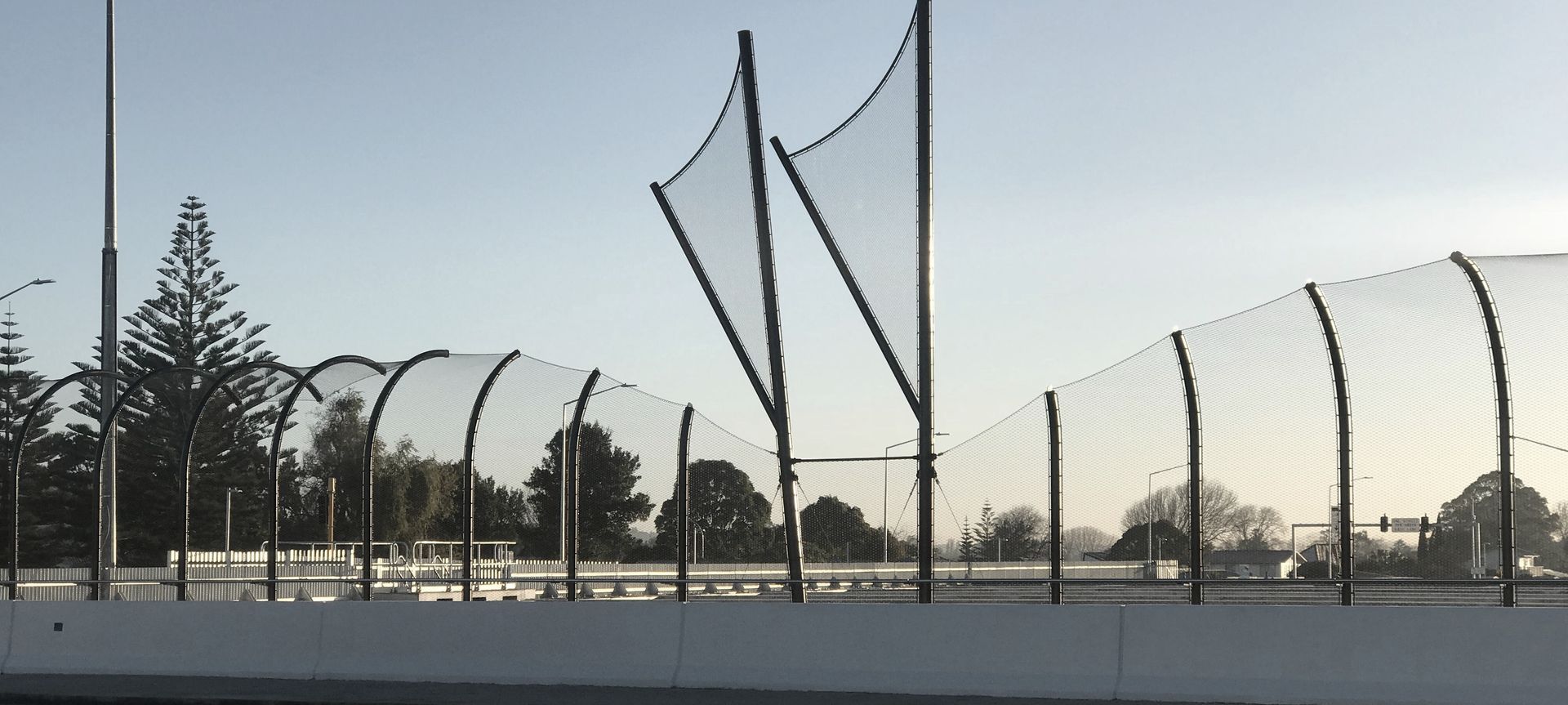 Kirkbride Road / SH20A intersection over bridge  - anti-throw mesh screens banner