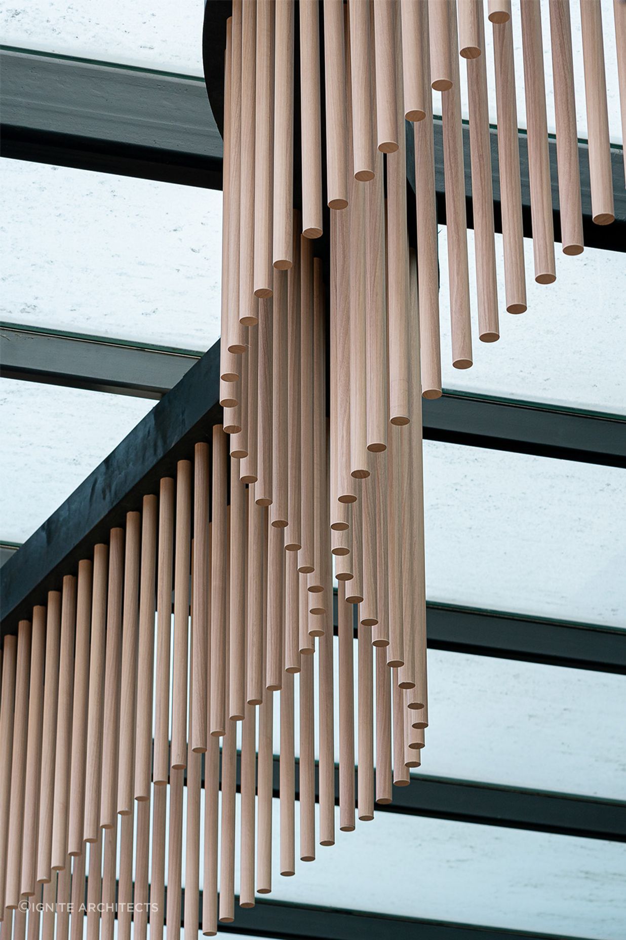 Wave-like timber battens on the building's façade