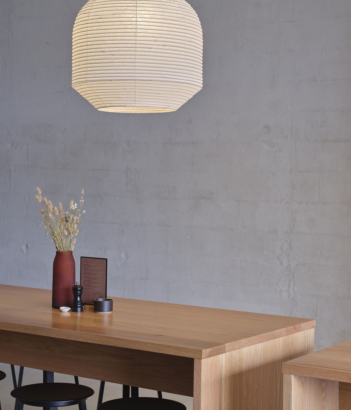 AkinHitaru-pendant-lights-glowing-over-red-oak-tablesSam-Hartnett-Photographer8.jpg