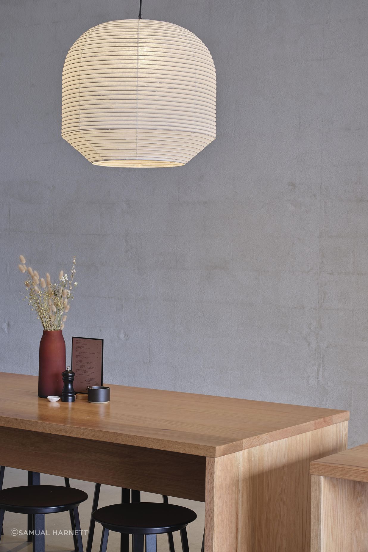 AkinHitaru-pendant-lights-glowing-over-red-oak-tablesSam-Hartnett-Photographer8.jpg