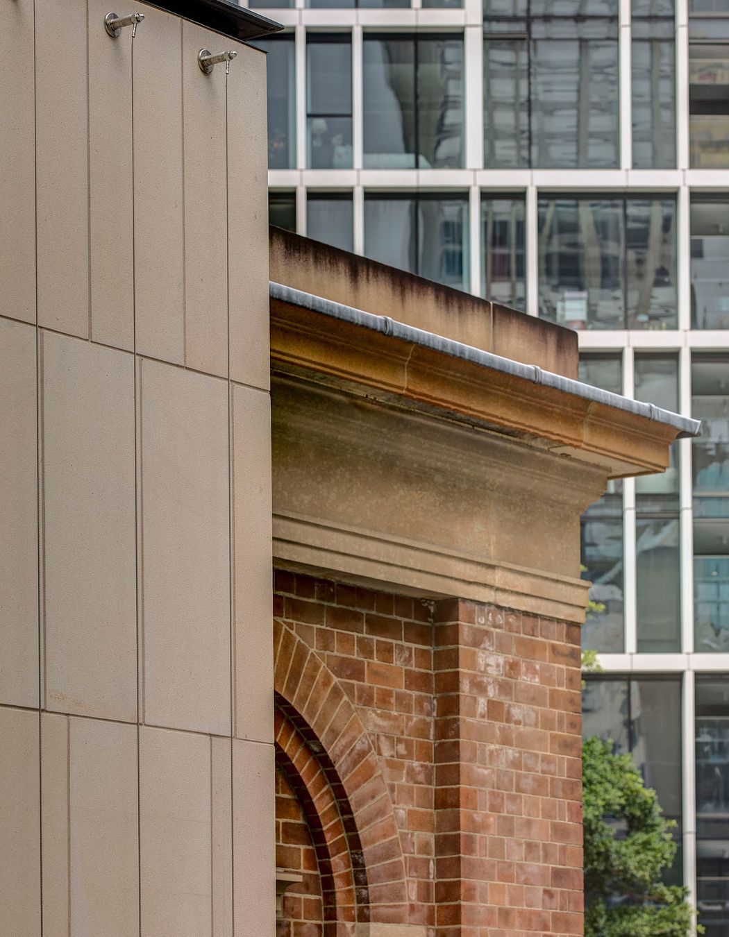 Contrast of historic and contemporary fabric.