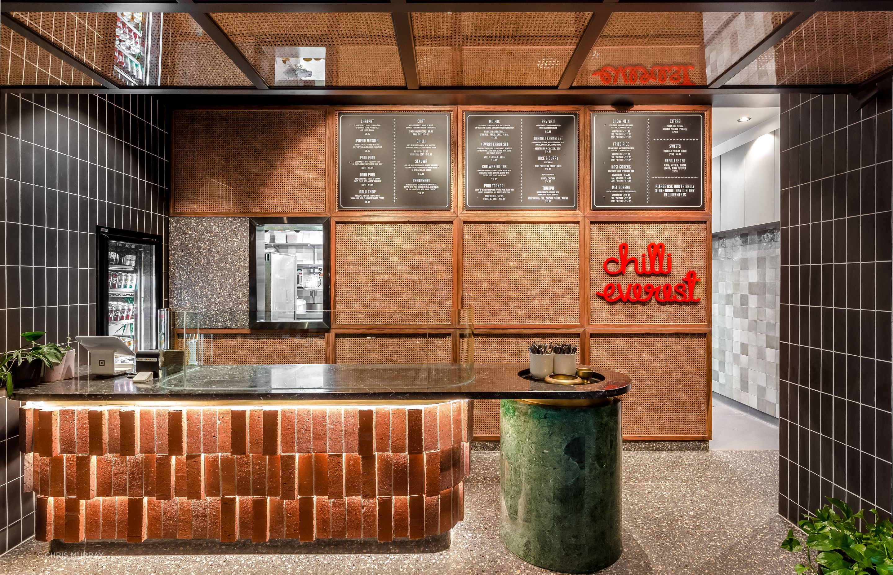 Graphite brick tiles (walls) and Rustic Red brick tiles and custom cut bricks (counter)