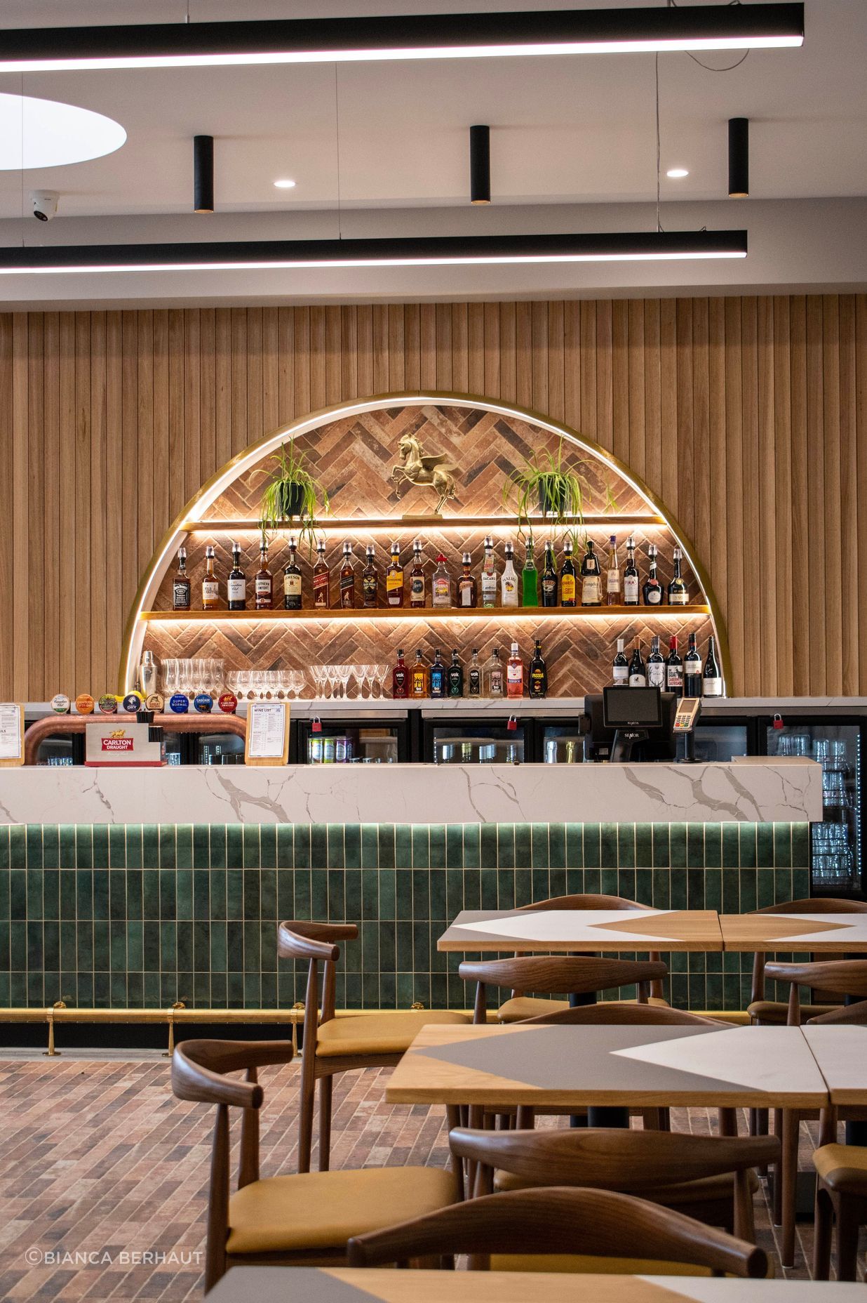Antico-Casale-Cotto-Brick-Tiles-Ballarat-Trottng-Club-Bar-Feature-and-floor.jpg
