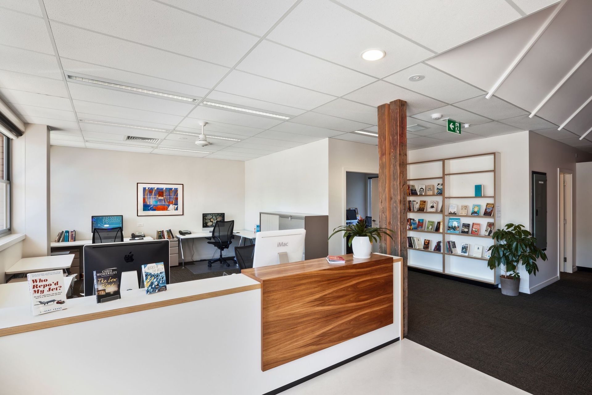 Timber features accent the light-filled office reception area at Scribe Publications