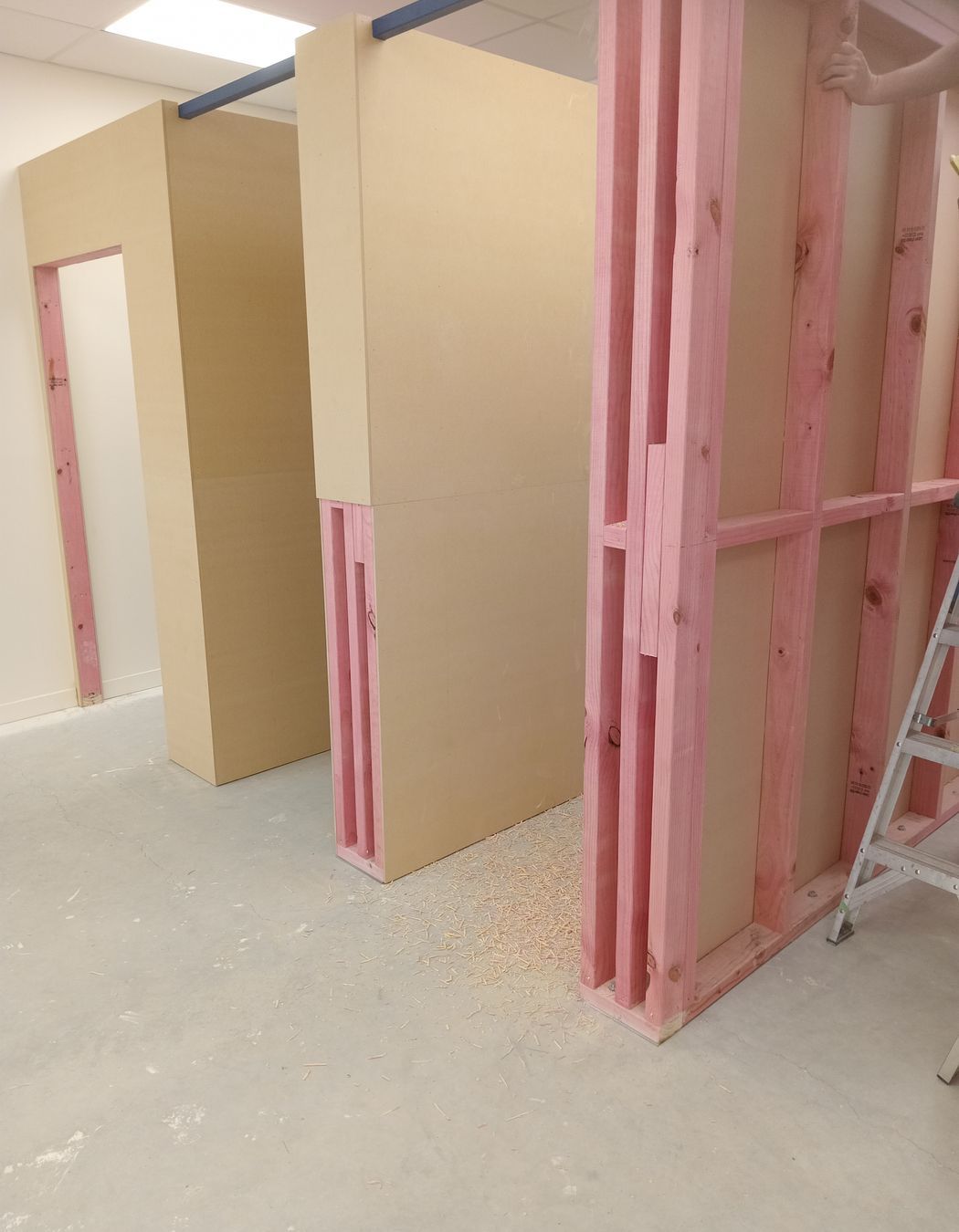 10-42-Thames-St-Oamaru-Caroline-Eve-mdf-sheeting-being-attached-to-the-framing-for-the-changing-rooms-JDBuilders.jpg