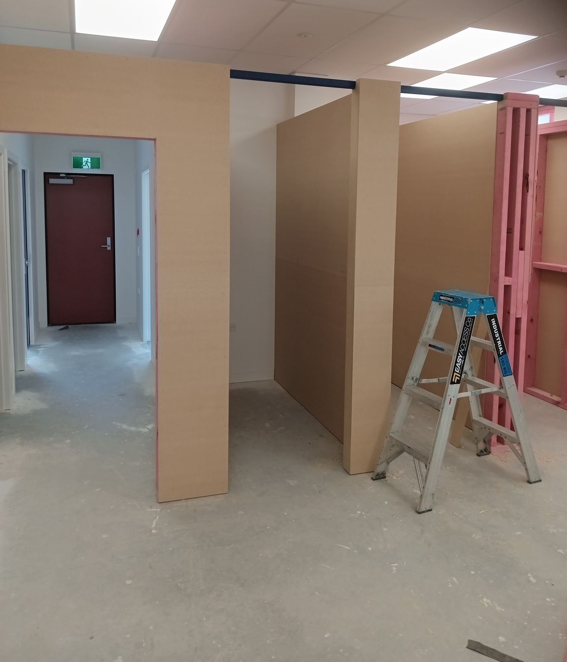 11-42-Thames-St-Oamaru-Caroline-Eve-mdf-sheeting-linings-being-installed-for-the-changing-rooms-JDBuilders.jpg