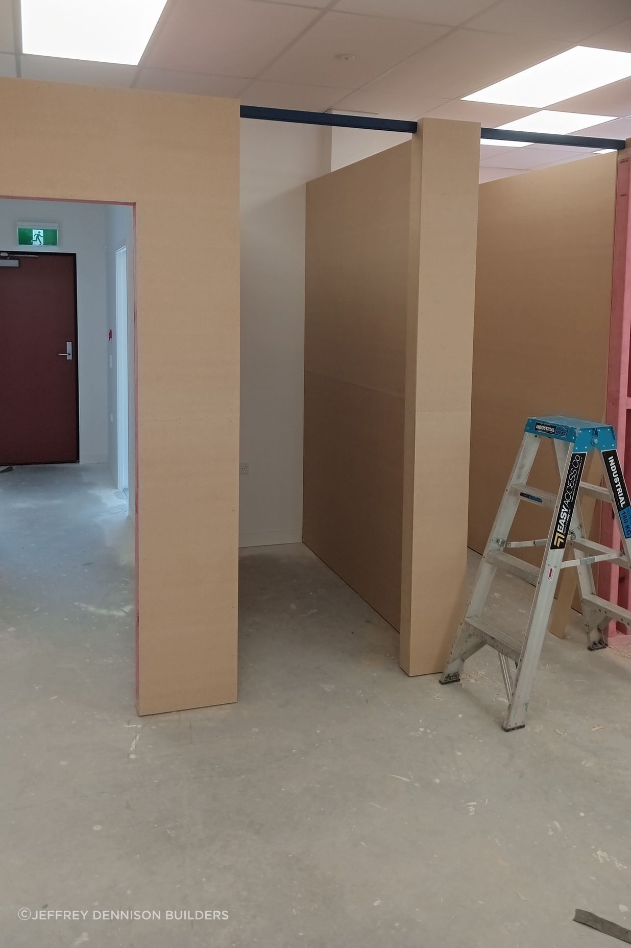 11-42-Thames-St-Oamaru-Caroline-Eve-mdf-sheeting-linings-being-installed-for-the-changing-rooms-JDBuilders.jpg