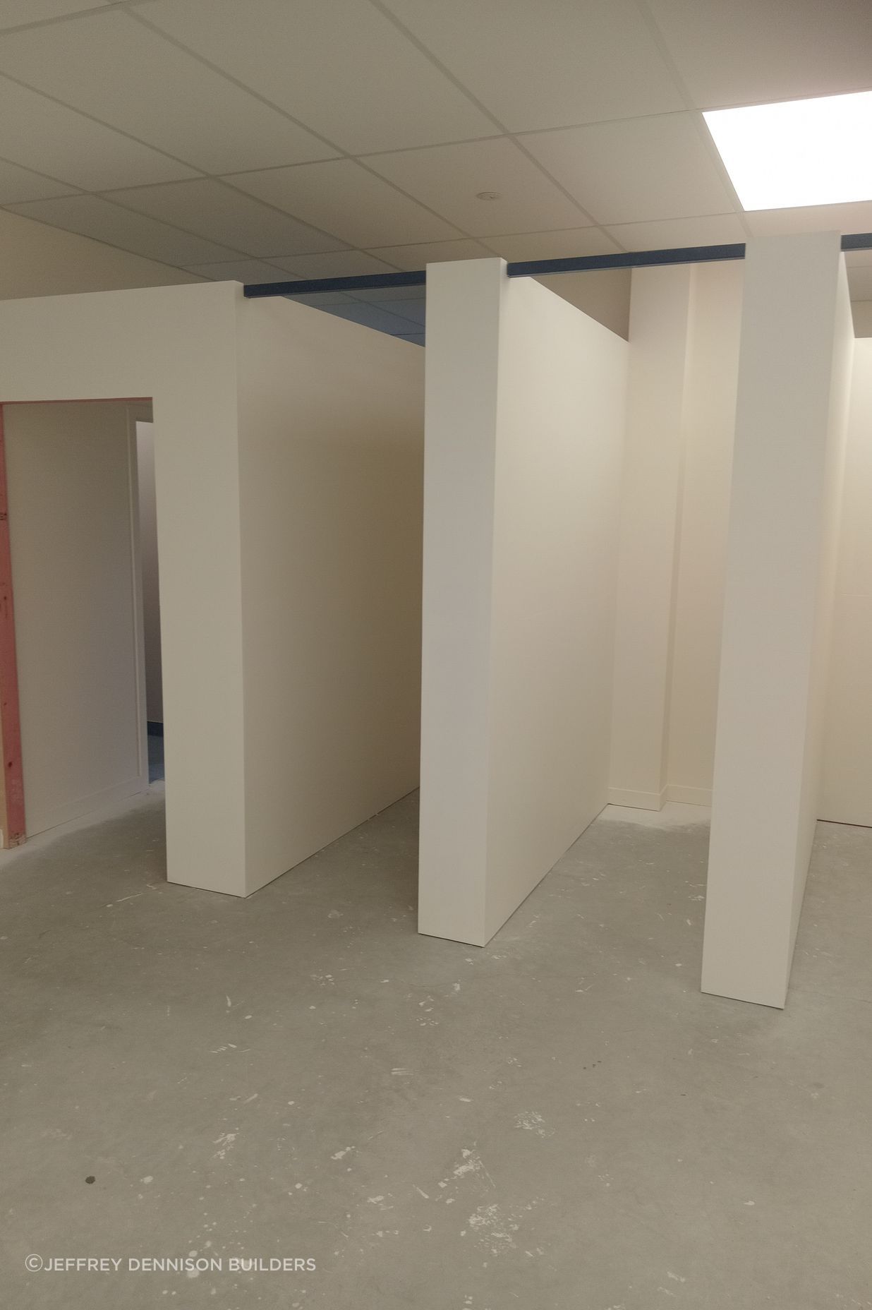 13-42-Thames-St-Oamaru-Caroline-Eve-Painting-the-changing-rooms-close-up-using-Resene-primer-SpaceCote-Low-Sheen-White-Colour-and-Quarter-Spanish-White-JDBuilders.jpg