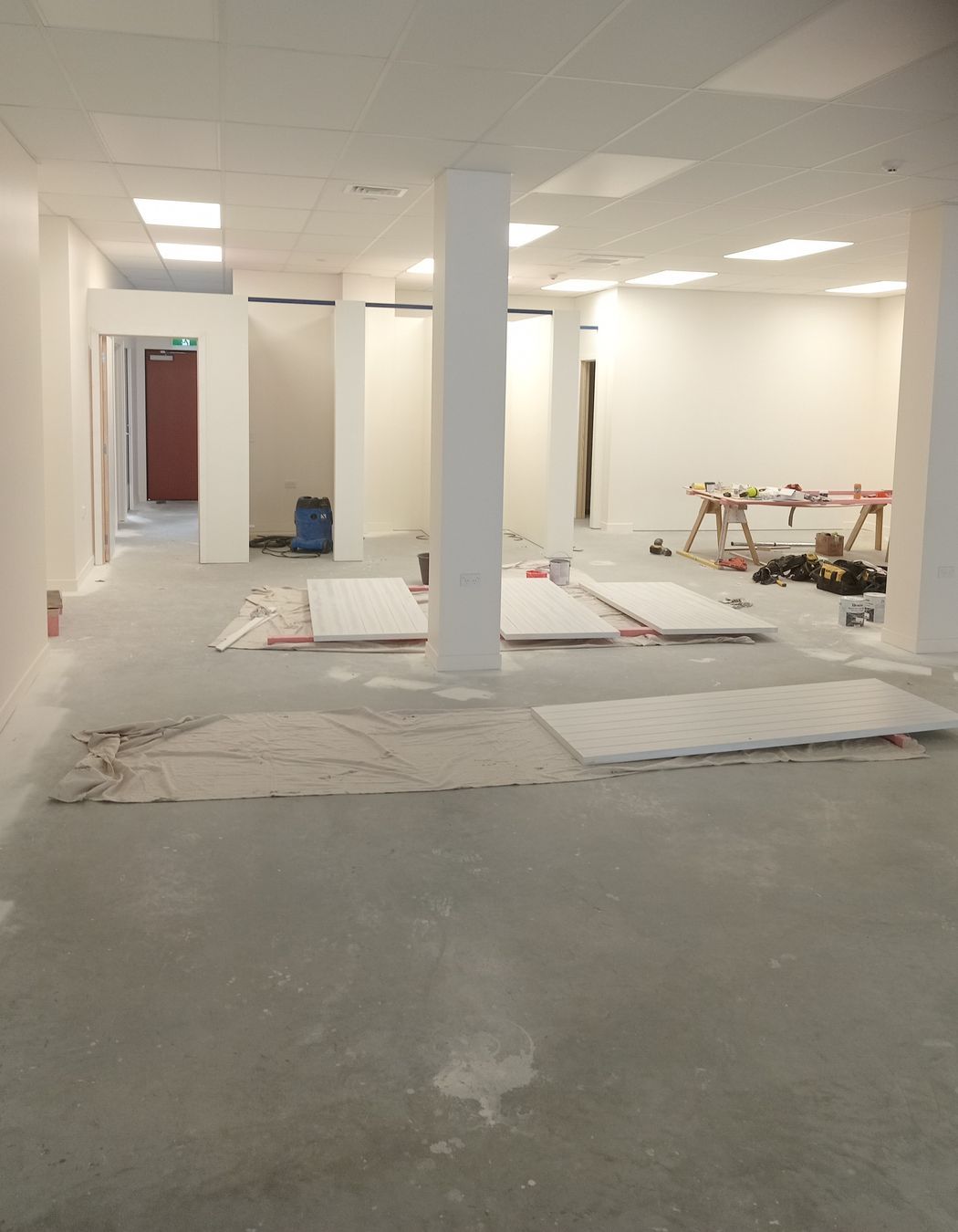 15-42-Thames-St-Oamaru-Caroline-Eve-Painting-the-changing-rooms-doors-using-Resene-primer-SpaceCote-Low-Sheen-White-Colour-and-Quarter-Spanish-White-JDBuilders.jpg