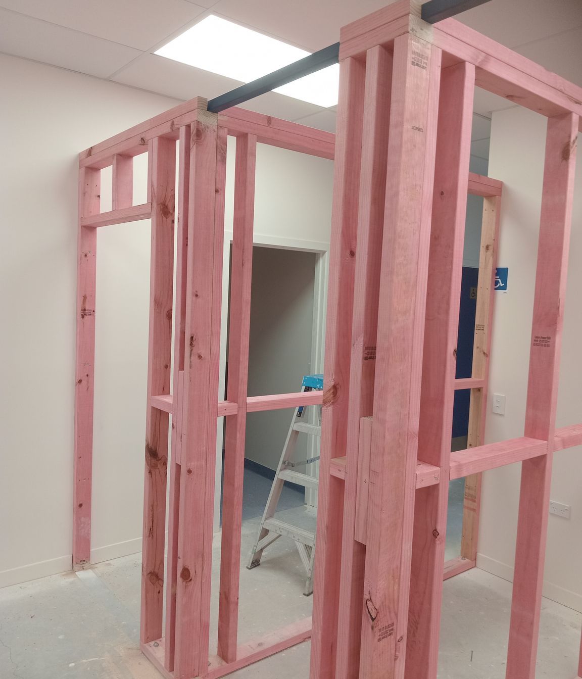 9-42-Thames-St-Oamaru-Caroline-Eve-close-up-of-the-newly-completed-framing-and-steel-support-bar-for-the-changing-rooms-JDBuilders.jpg