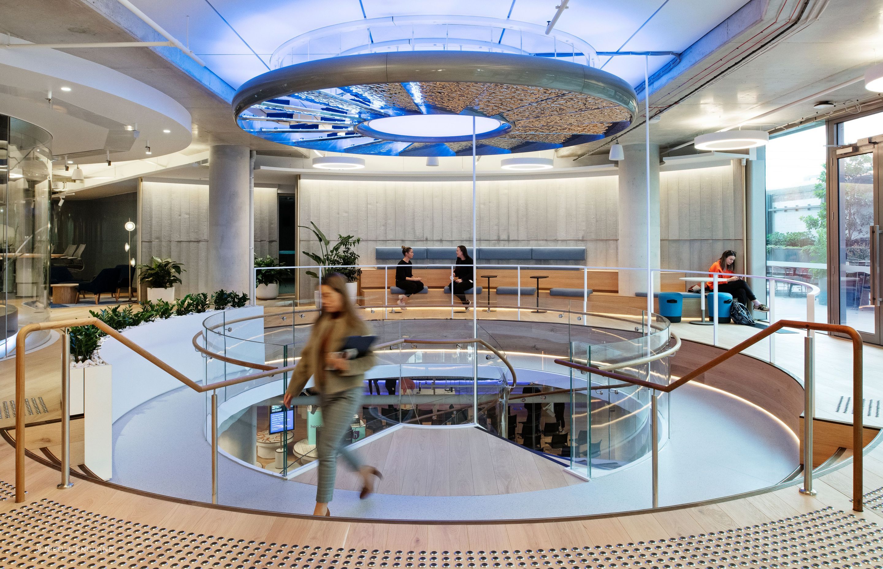 The customer and business brand partner floor, with its custom Board Form Veneer