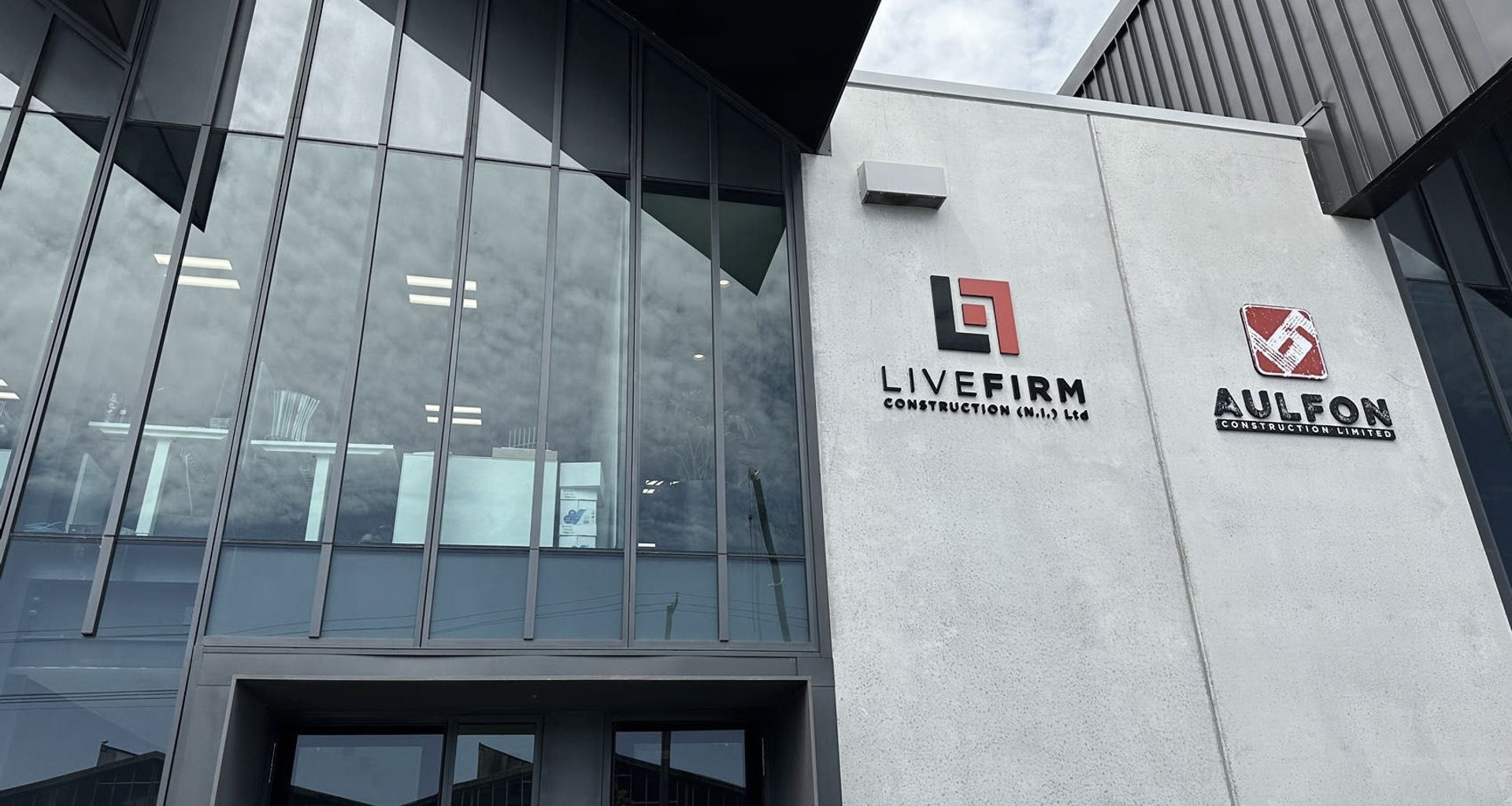 LIVEFIRM Construction & AULFON Construction HQ banner