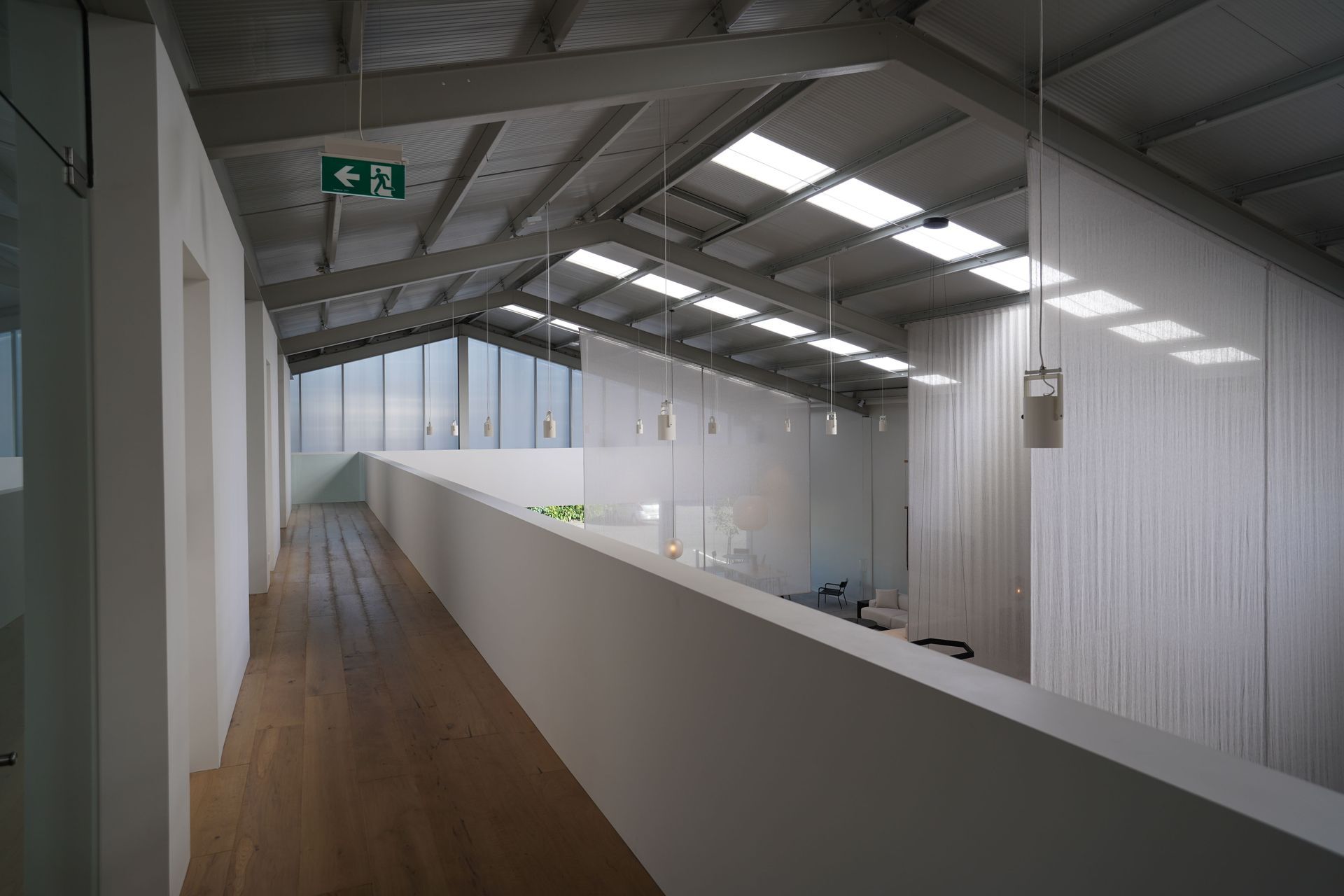 Polycarbonate cladding with purpose. This wasn’t just about looks, it lets in natural light and cuts down on the need for artificial lighting. A design win and a performance upgrade.