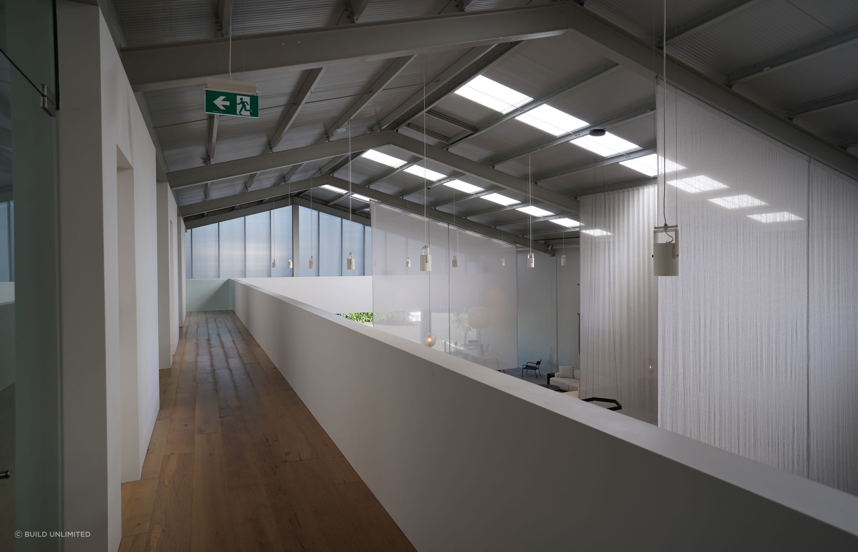 Polycarbonate cladding with purpose. This wasn’t just about looks, it lets in natural light and cuts down on the need for artificial lighting. A design win and a performance upgrade.