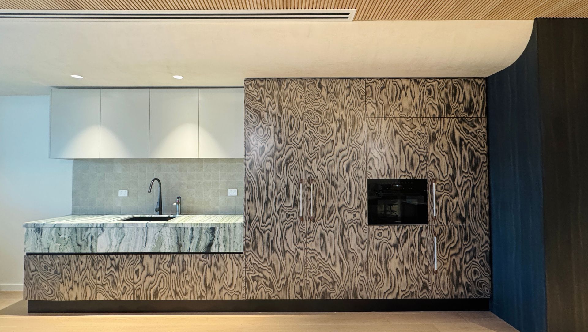 A boutique workplace fit-out celebrates texture, craftsmanship, and trust. banner