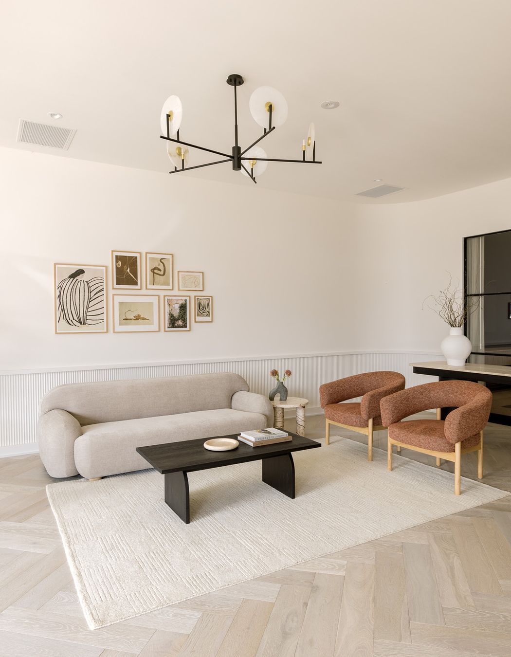 Pictured here: Sidney Plump 3 Seater Sofa. Jenson Occasional Chair, Amara Round Leg Side Table