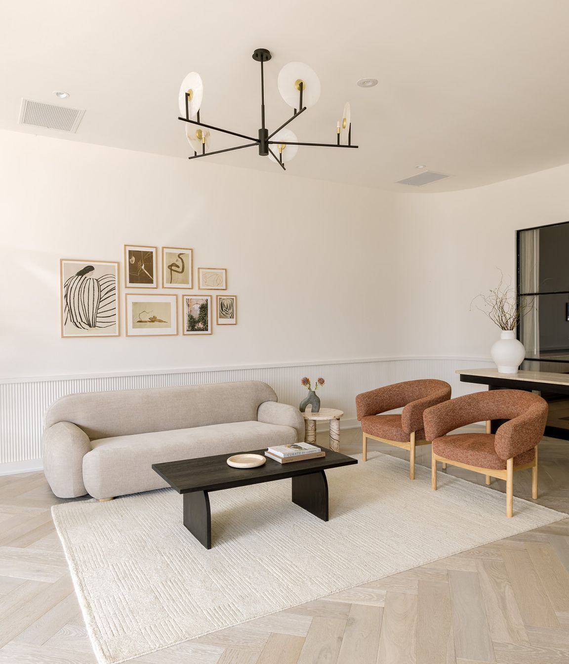 Pictured here: Sidney Plump 3 Seater Sofa. Jenson Occasional Chair, Amara Round Leg Side Table