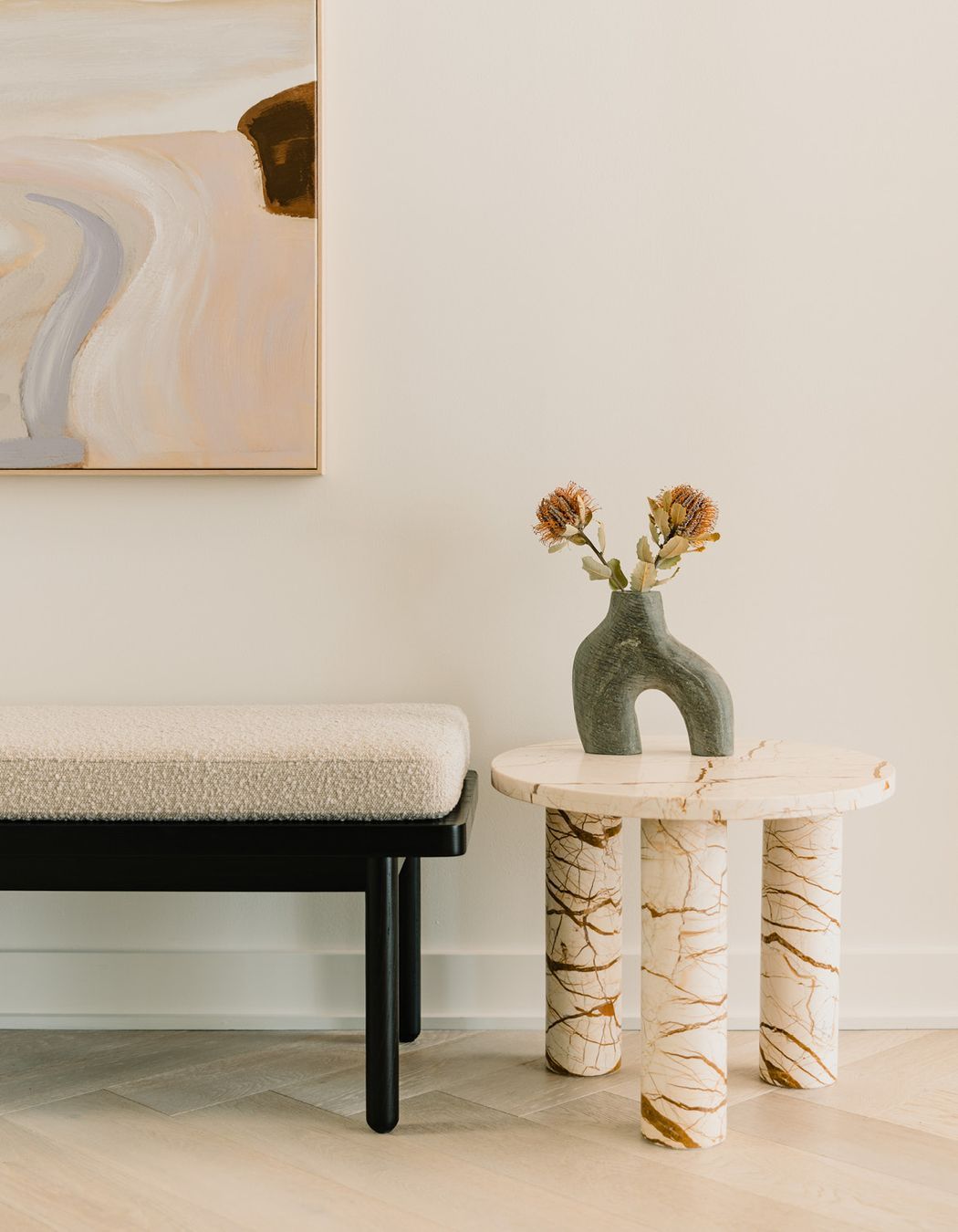 Pictured here: Amara Round Leg Side Table