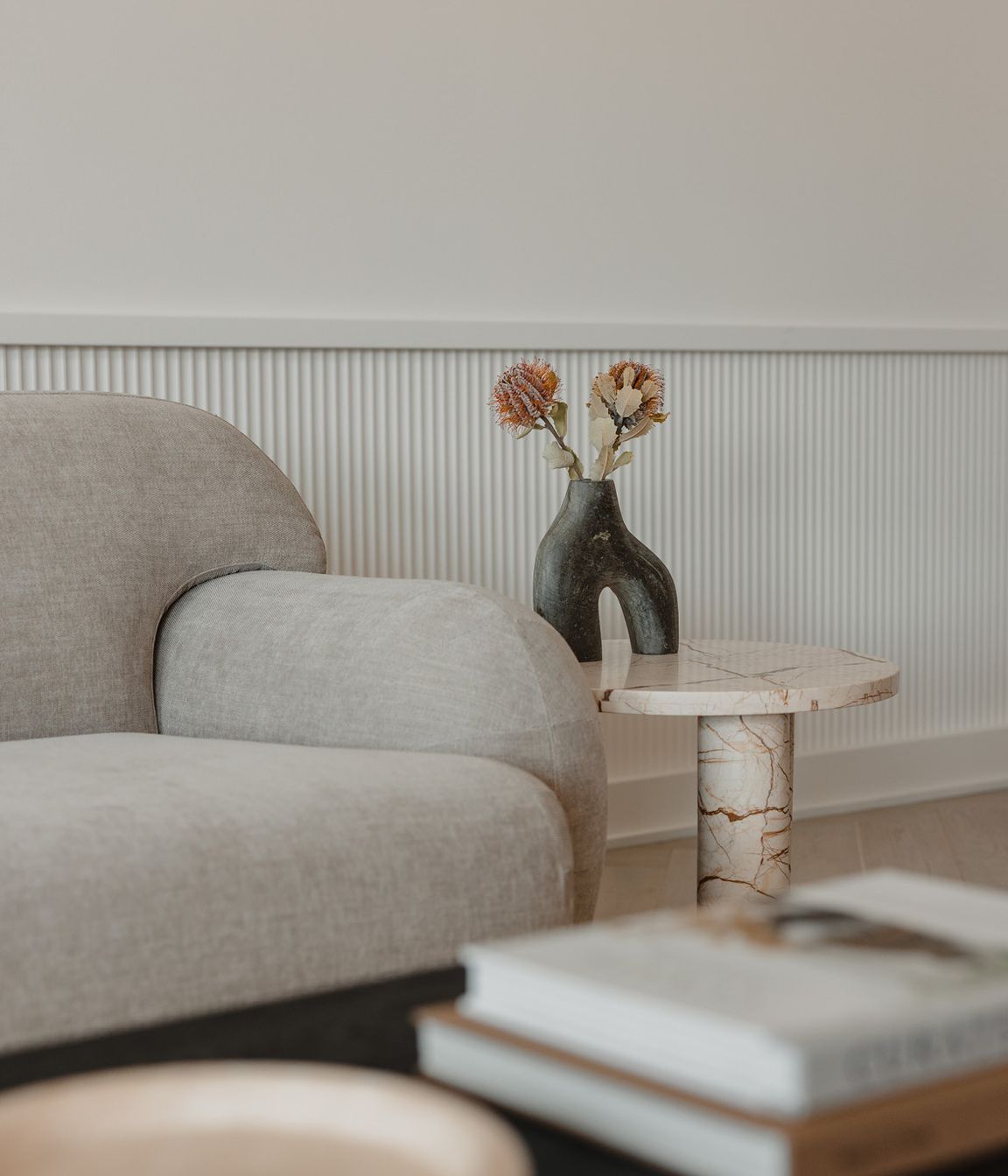 Pictured here: Sidney Plump 3 Seater Sofa and Amara Round Leg Side Table