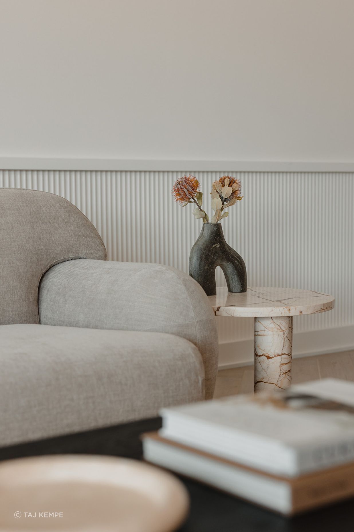 Pictured here: Sidney Plump 3 Seater Sofa and Amara Round Leg Side Table