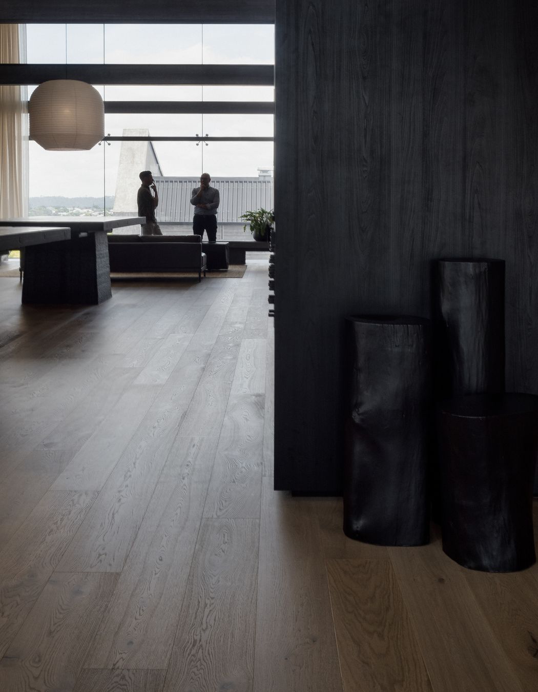 Prime Laminate Burnished Black. Designed by Wonder Group Design, Forte Flooring Auckland Showroom.