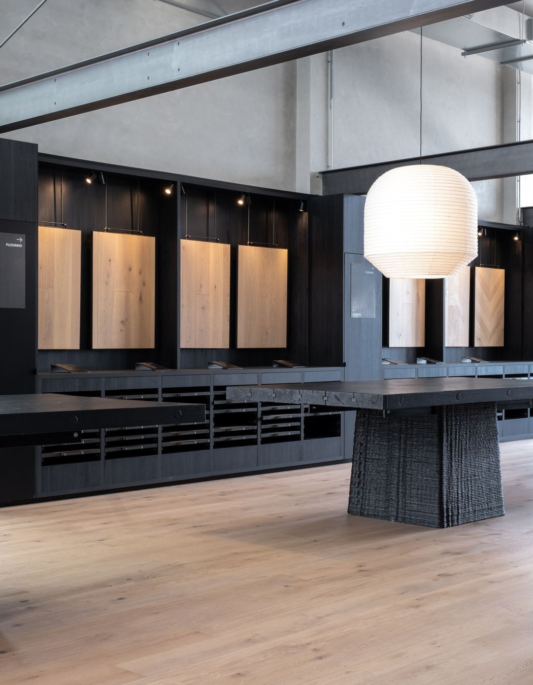 Prime Laminate Burnished Black. Designed by Wonder Group Design, Forte Flooring Auckland Showroom.