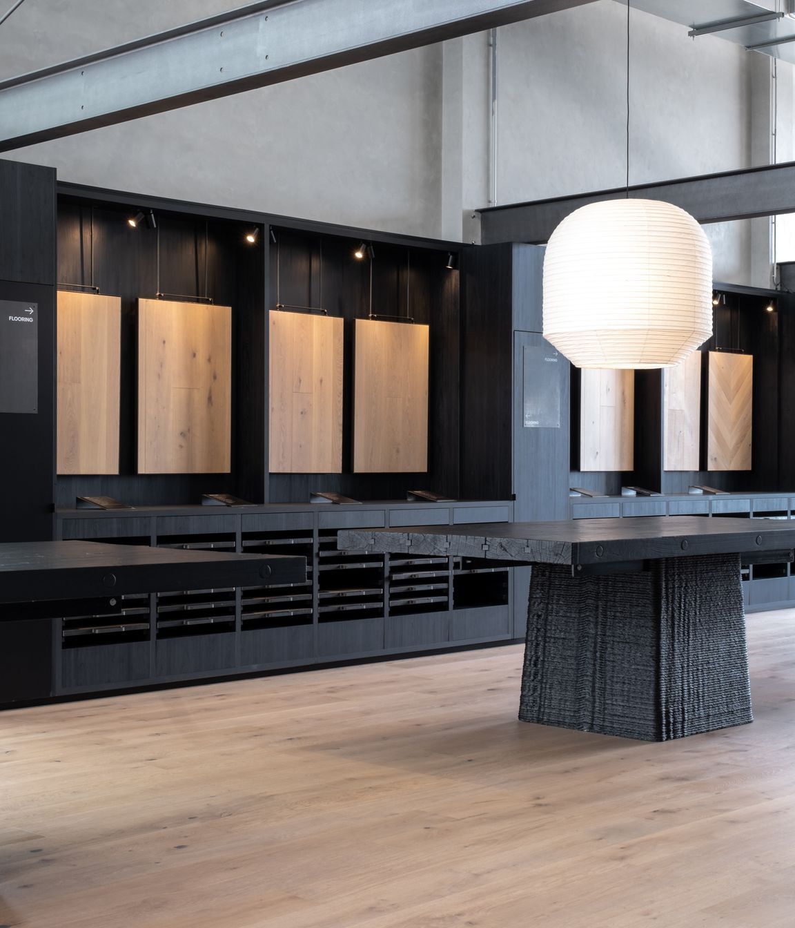 Prime Laminate Burnished Black. Designed by Wonder Group Design, Forte Flooring Auckland Showroom.