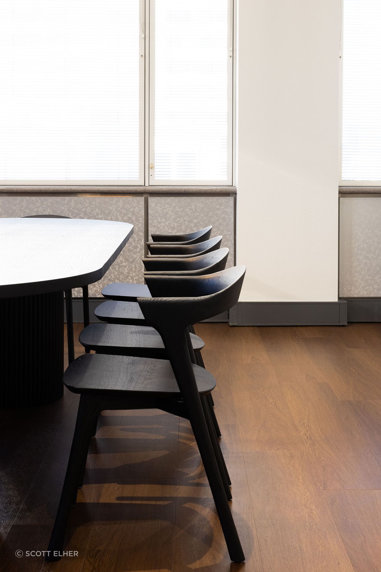 Pictured here: Benjamin Ripple Oval Dining Table and Ethnicraft Bok Dining Chair